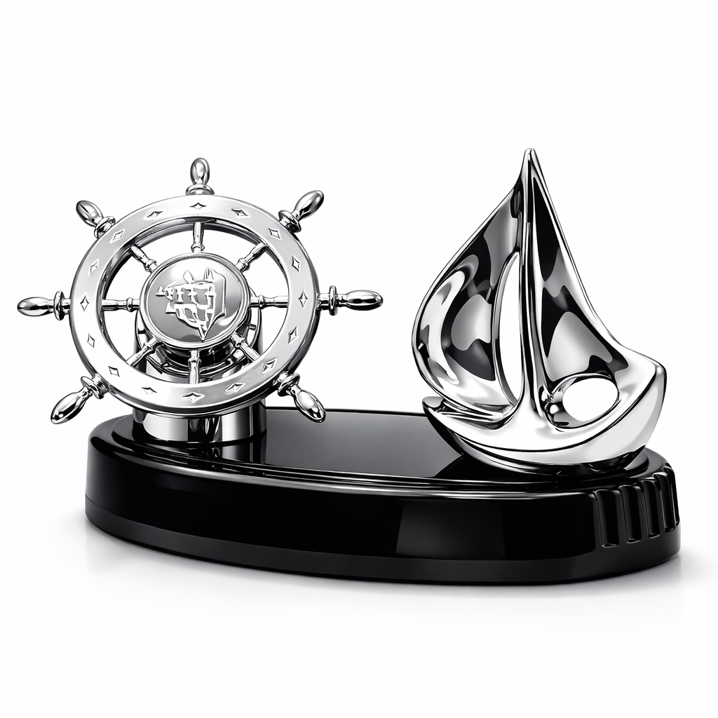 Decorative nautical sculpture with a ship wheel and sailboat on a black base.