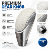 A premium gear knob upgrade kit for cars, SUVs, and trucks, featuring a textured off-white leather top and a brushed silver metal base. The image includes feature callouts and detail insets on a clean white background.