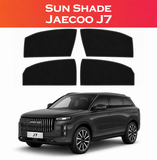 Four black Jaecoo J7 car sun shades displayed above a black SUV on a white background with a red-orange gradient header reading 'SUN SHADE JAECOO J7'.