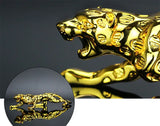 Golden cheetah dashboard decoration close-up view